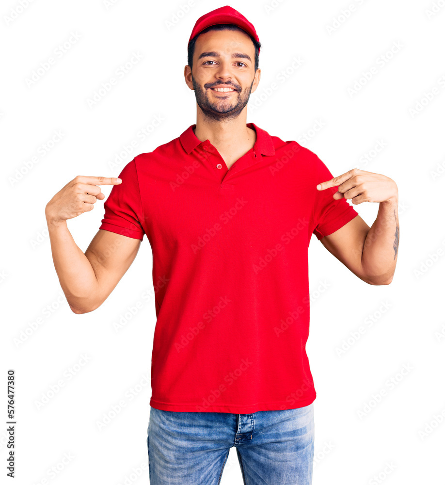 Young handsome hispanic man wearing delivery courier uniform looking confident with smile on face, pointing oneself with fingers proud and happy. Young handsome hispanic man wearing delivery courier uniform looking confident with smile on face, pointing oneself with fingers proud and happy.