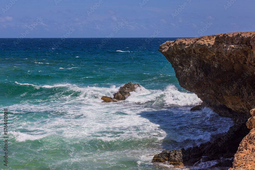 Gorgeous seascape view. Waves and rocky coastline. Beautiful nature backgrounds. Aruba island. 