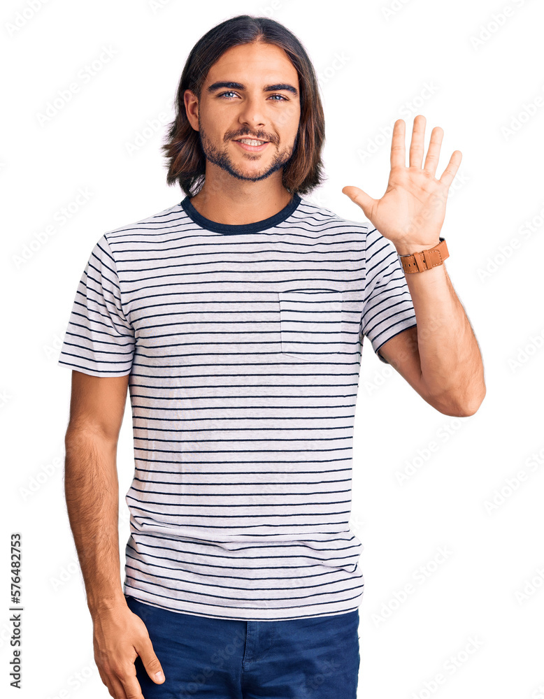 Young handsome man wearing casual clothes showing and pointing up with fingers number five while smiling confident and happy. Young handsome man wearing casual clothes showing and pointing up with fingers number five while smiling confident and happy.
