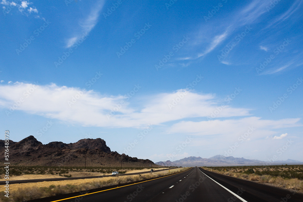 Lonely road on Route 66 in a summer day. Arizona, United States. 
