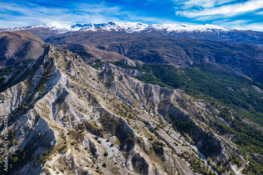 Aerial view of the mountains and valleys in the Sierra Nevada mountains in Spain