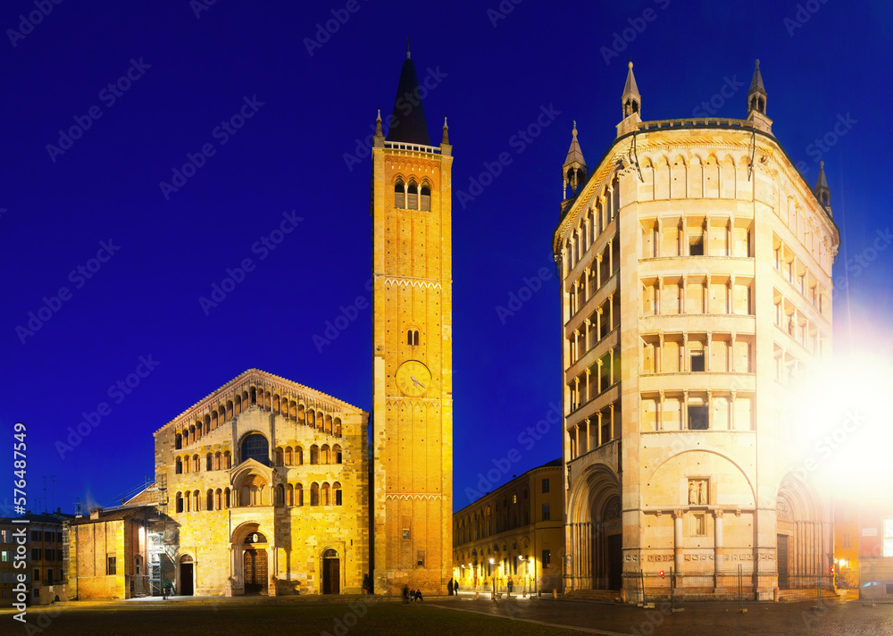 City square with Baptistery and Cathedral of night Parma in Italy outdoor.