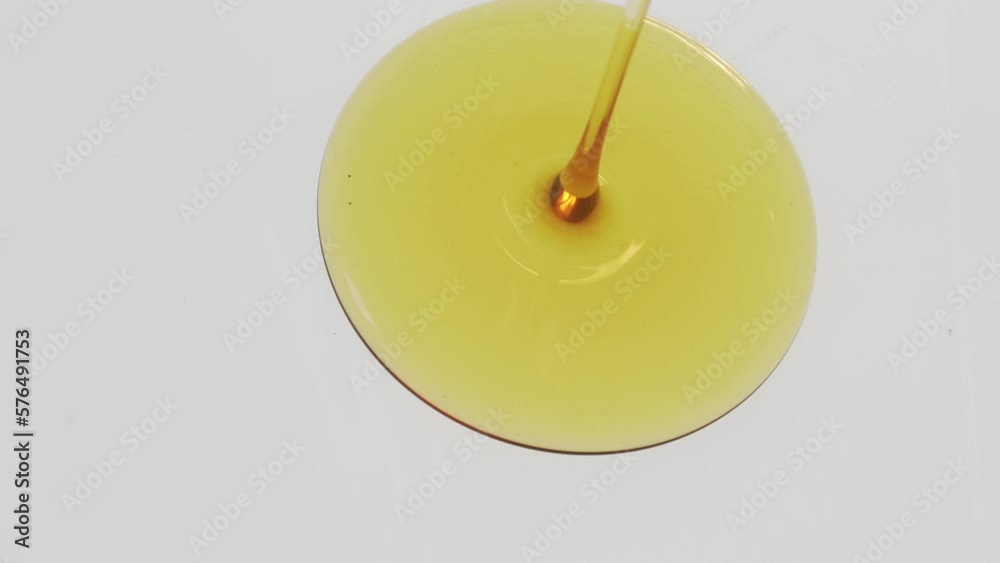 Fresh honey dripping down on white background
Fresh honey dripping down on white background