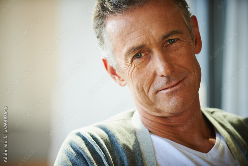 Fototapeta premium Rich in life experience. Cropped view of a handsome mature man looking at the camera.