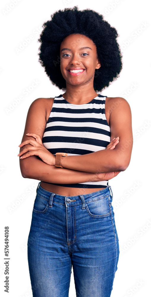 Young african american woman wearing casual clothes happy face smiling with crossed arms looking at the camera. positive person. Young african american woman wearing casual clothes happy face smiling with crossed arms looking at the camera. positive person.