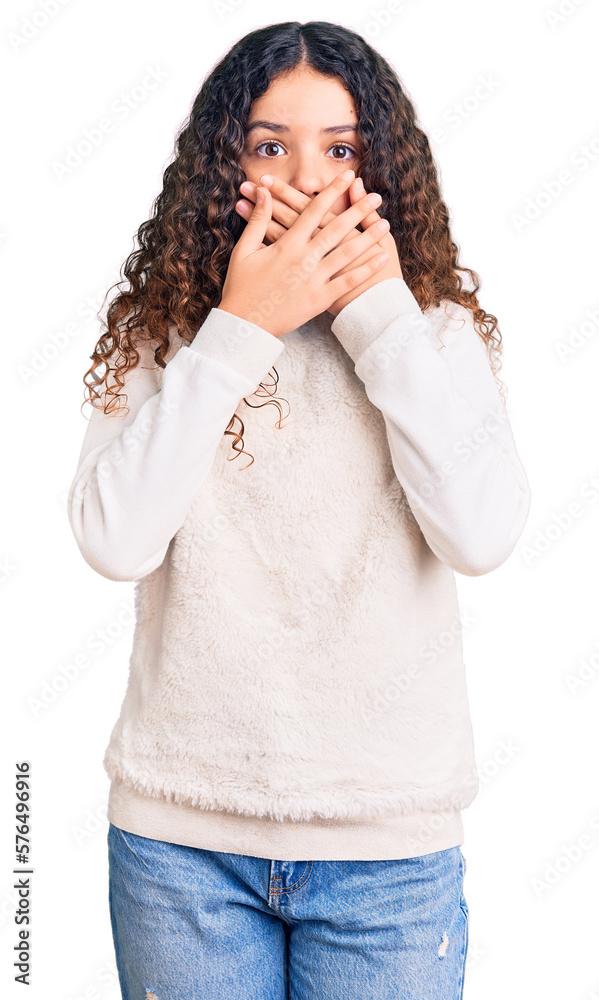 Beautiful kid girl with curly hair wearing casual clothes shocked covering mouth with hands for mistake. secret concept. Beautiful kid girl with curly hair wearing casual clothes shocked covering mouth with hands for mistake. secret concept.