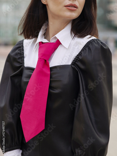 Obraz na plátně Pink fashion designer female tie cravat on a model women