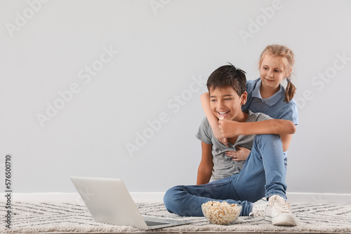 Little boy and his sister w...