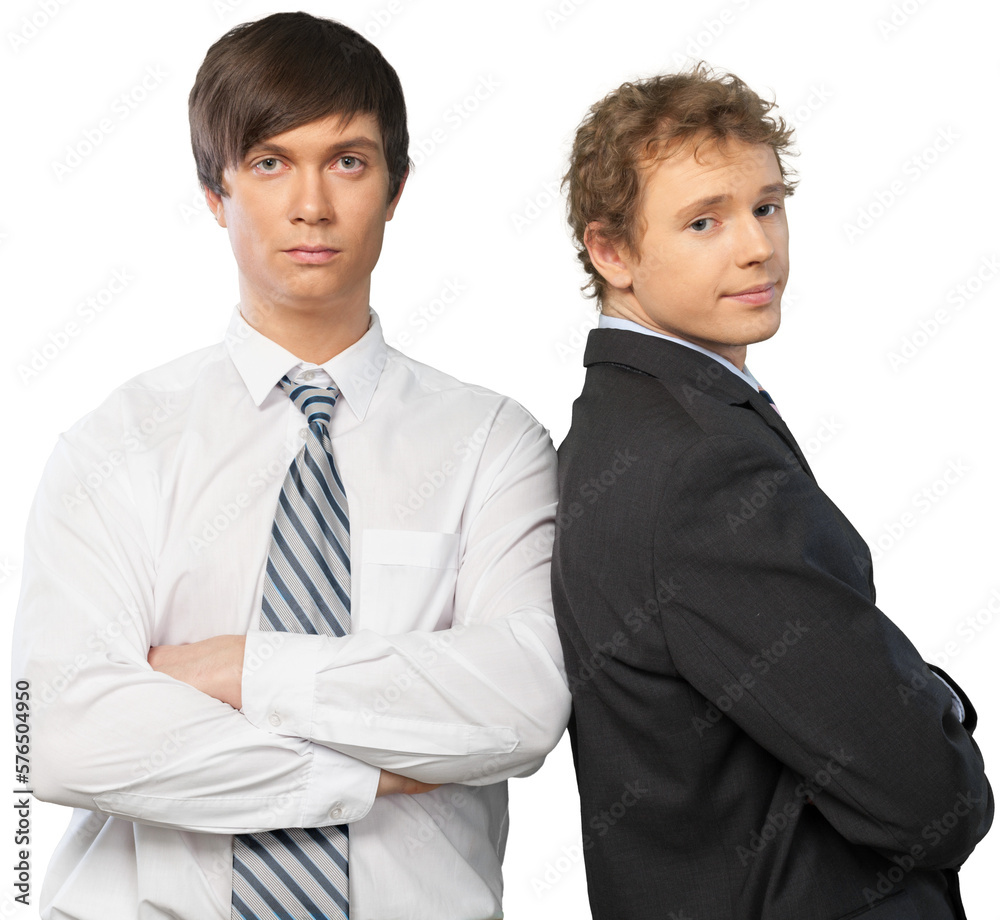 Confident couple businessman standing in a suit with arms crossed Confident couple businessman standing in a suit with arms crossed