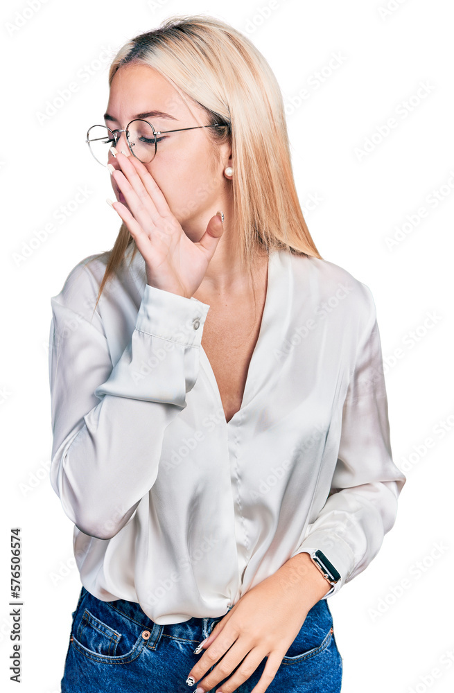 Beautiful blonde woman wearing elegant shirt and glasses hand on mouth telling secret rumor, whispering malicious talk conversation Beautiful blonde woman wearing elegant shirt and glasses hand on mouth telling secret rumor, whispering malicious talk conversation