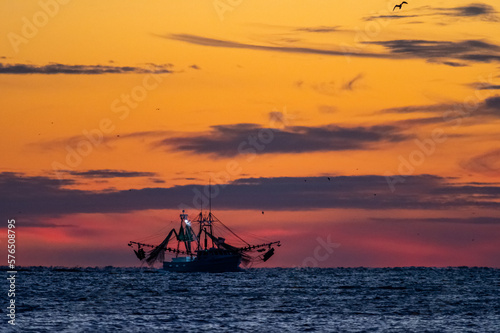 Fishing Boat with Red Sky