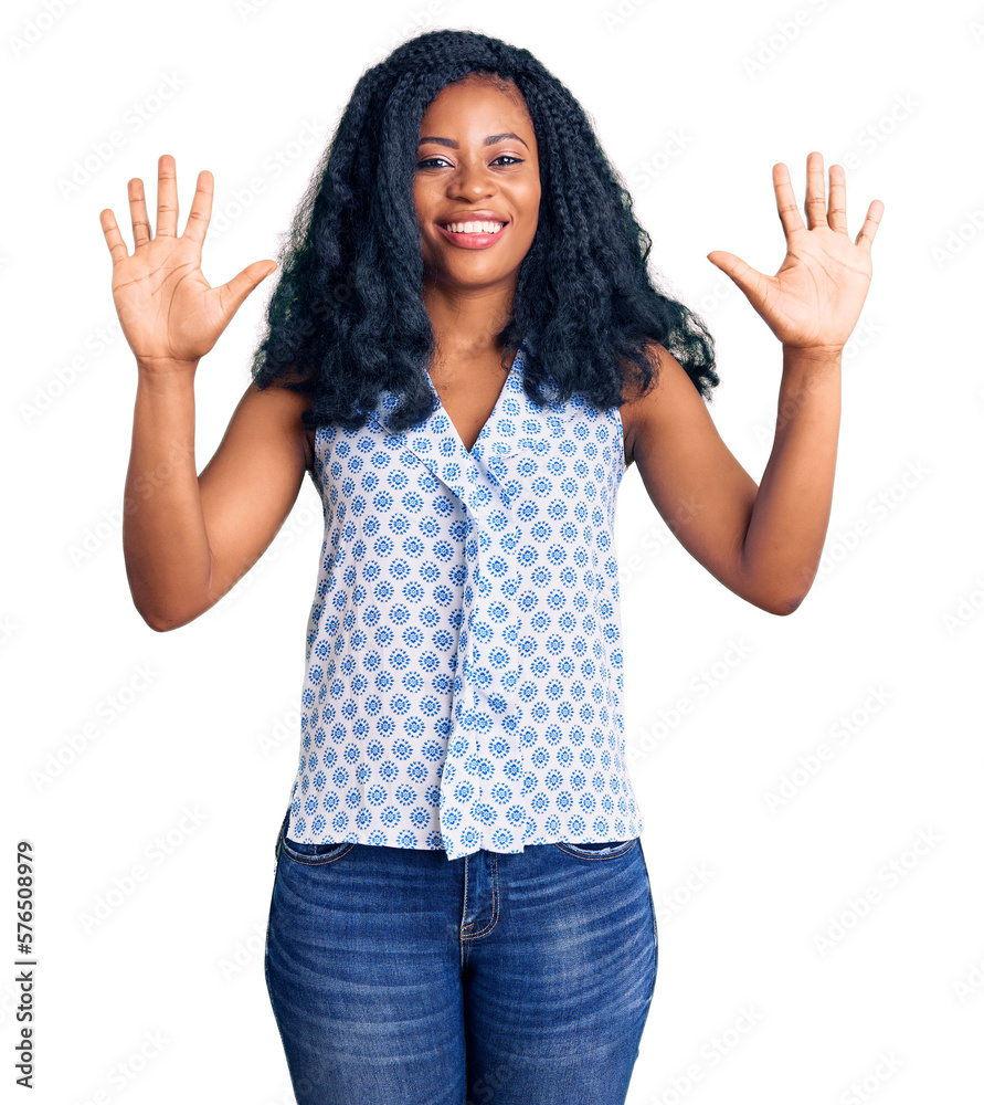 Beautiful african american woman wearing casual summer shirt showing and pointing up with fingers number ten while smiling confident and happy. Beautiful african american woman wearing casual summer shirt showing and pointing up with fingers number ten while smiling confident and happy.