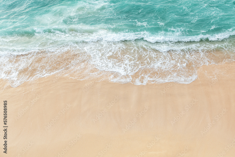 Top view of the seashore with clean sand and waves. Seascape.