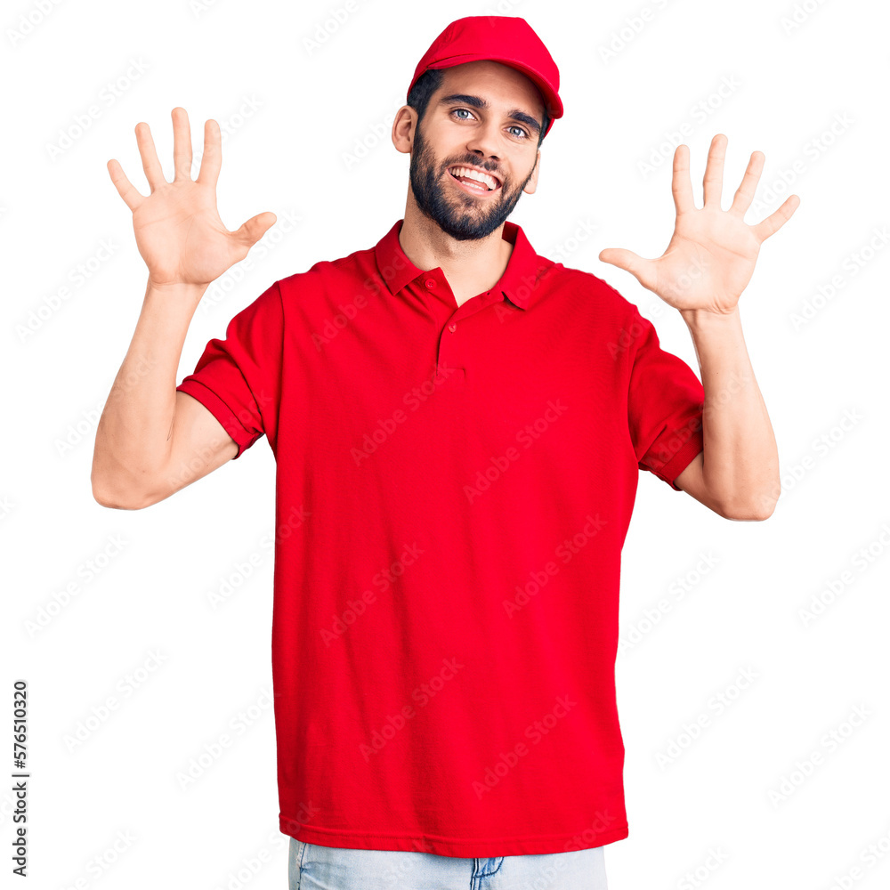 Young handsome man with beard wearing delivery uniform showing and pointing up with fingers number ten while smiling confident and happy. Young handsome man with beard wearing delivery uniform showing and pointing up with fingers number ten while smiling confident and happy.
