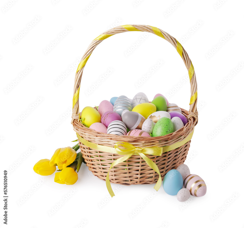 Wicker basket with beautifully painted Easter eggs and tulips isolated on white Wicker basket with beautifully painted Easter eggs and tulips isolated on white