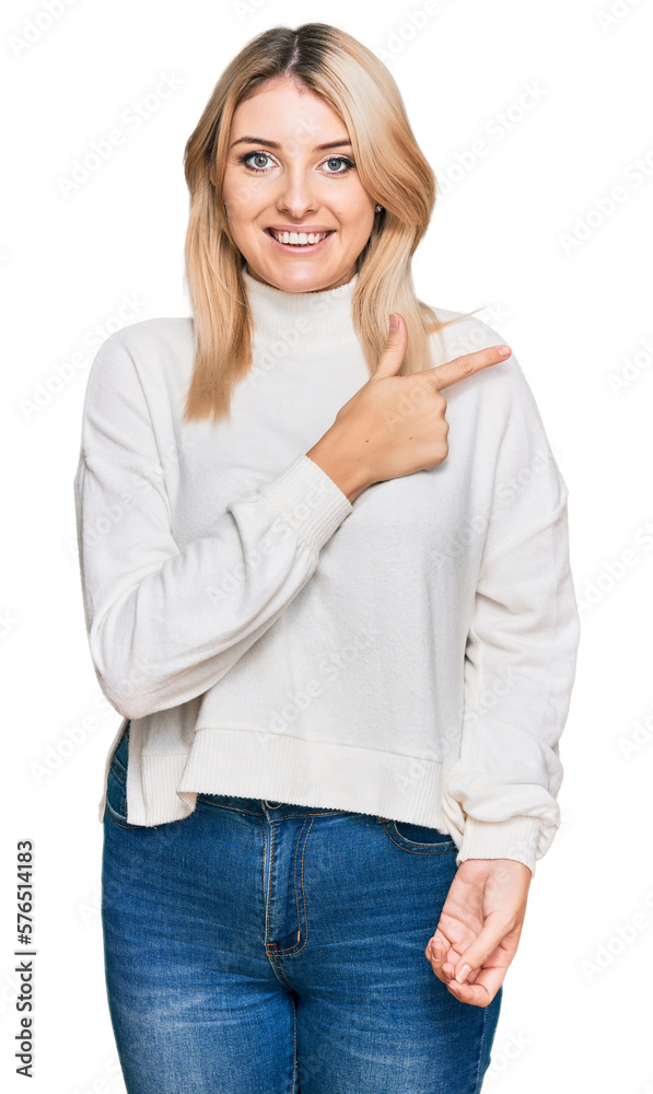 Young caucasian woman wearing casual winter sweater cheerful with a smile on face pointing with hand and finger up to the side with happy and natural expression Young caucasian woman wearing casual winter sweater cheerful with a smile on face pointing with hand and finger up to the side with happy and natural expression