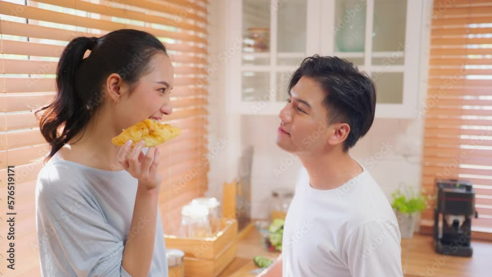 Asian young new marriage couple spend time together in kitchen at home Asian young new marriage couple spend time together in kitchen at home