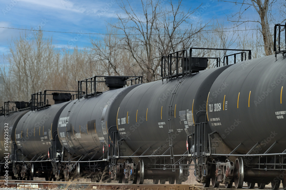 A freight train comprised of tank cars carrying flammable gas heads ...
