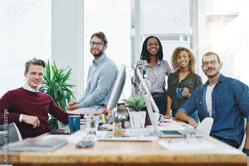 Go get that business growth. Portrait of a team of young go getters working in a modern office. photo