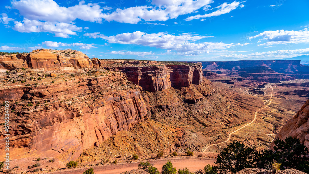 The 70+ Mile rugged White Rim Road as it winds through Canyonlands National Park, Utah, United States The 70+ Mile rugged White Rim Road as it winds through Canyonlands National Park, Utah, United States