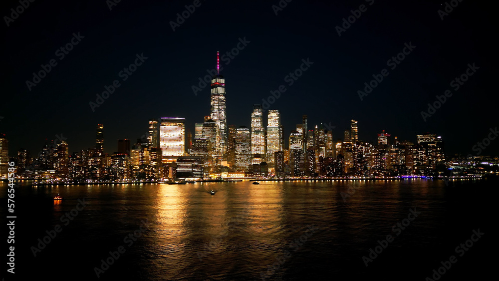 Aerial view over the skyline of Manhattan New York City at night - drone photography