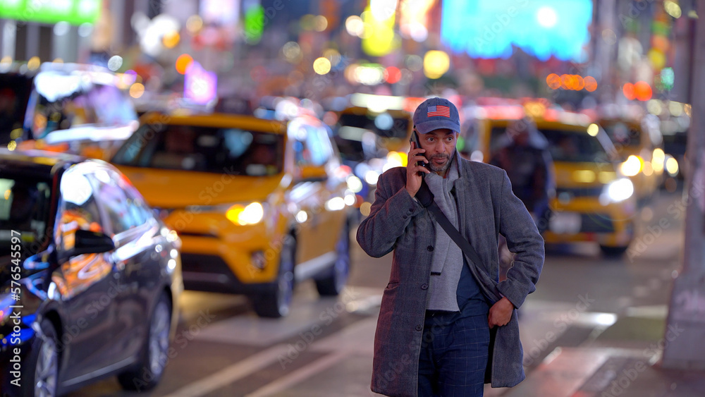 Obraz premium Afro-American Man in the streets of New York at Times Square - travel photography