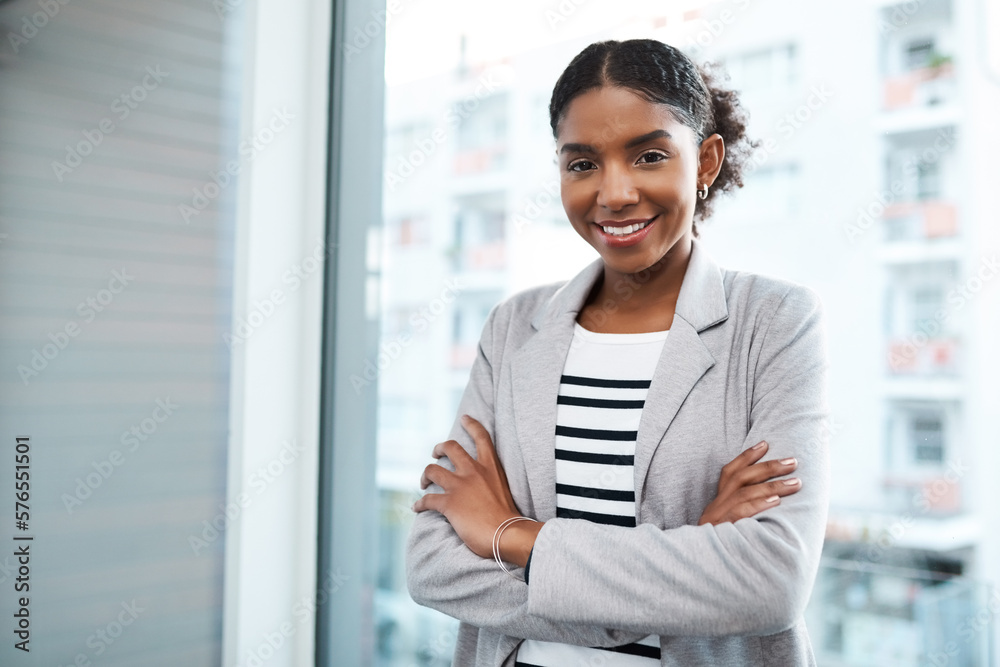 Stand firm in the face of business. Portrait of a confident young businesswoman working in a modern office.