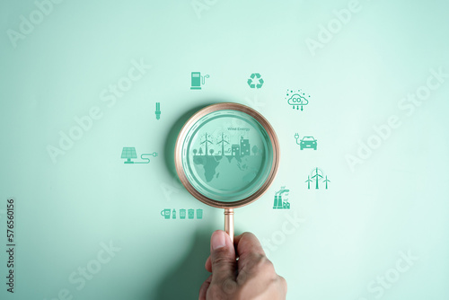 Environmental, environmental, social, and governance in sustainable and ethical business on the Network connection, Magnifier focus to eco system icon for develop green energy concept.