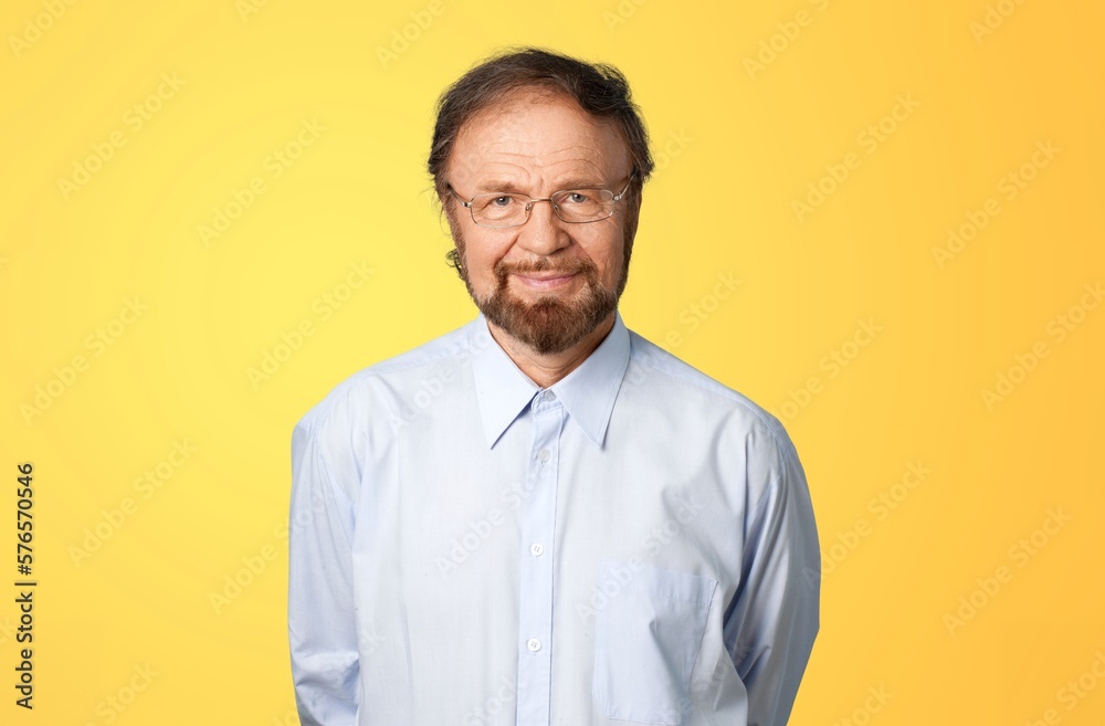 Happy senior smart man posing on background Happy senior smart man posing on background