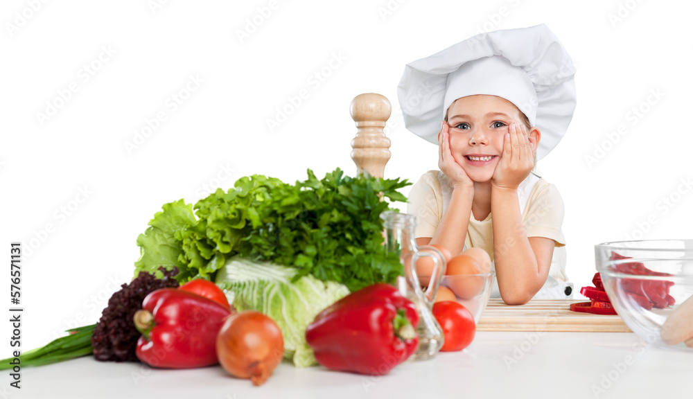 little cute chef holding wooden spoon with different pair of gloves looking at camera and smiling on gray background little cute chef holding wooden spoon with different pair of gloves looking at camera and smiling on gray background