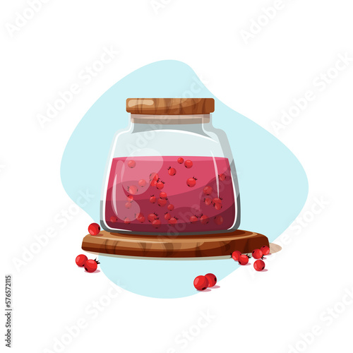 A glass jar with a berry drink. Compote in a jar.