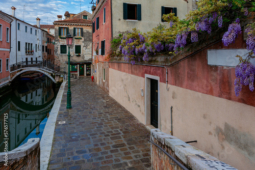 Architecture of Venice, Italy. Historic houses traditional architecture on the canal in Venice. © Andrey
