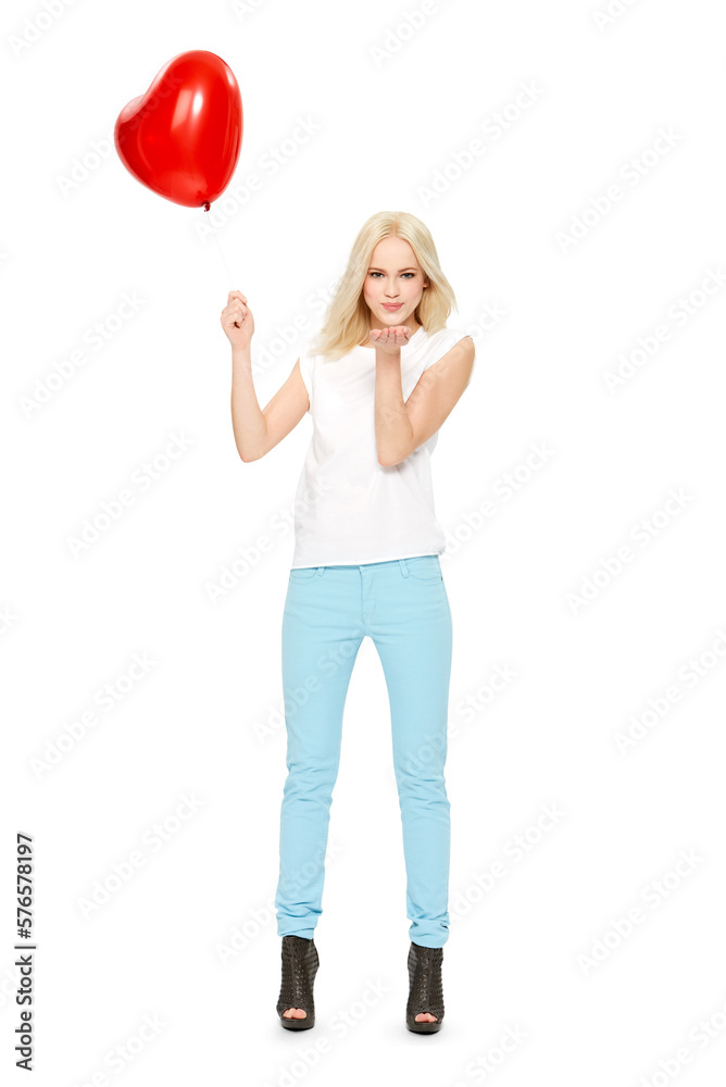 A beautiful woman holding a red heart balloon in the air and blowing kisses on her beloved and celebrating the romantic event of valentine's day isolated on a png background. A beautiful woman holding a red heart balloon in the air and blowing kisses on her beloved and celebrating the romantic event of valentine's day isolated on a png background.