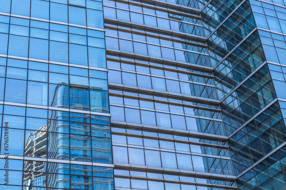 Urban abstract - windowed corner of office building.