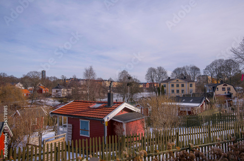 Photography Allotment gardening houses and skyscraper apartment buildings an early spring su