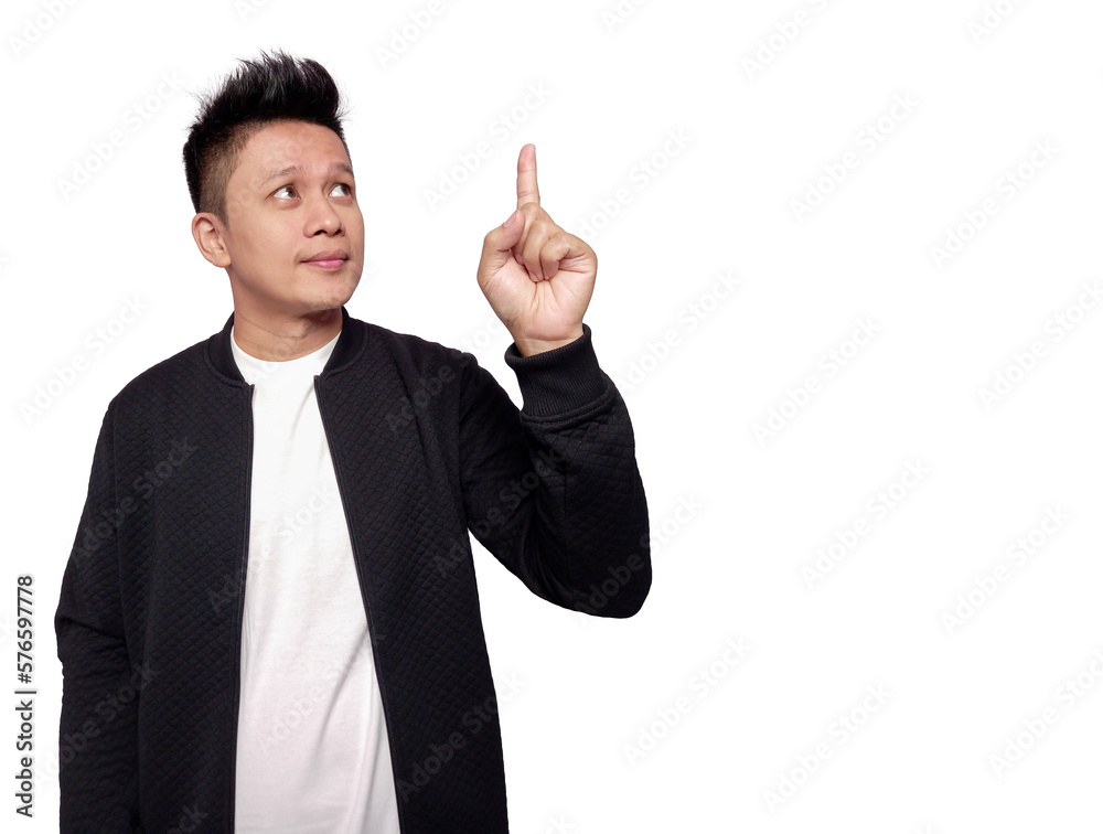 Handsome man pointing and looking up with empty space Handsome man pointing and looking up with empty space
