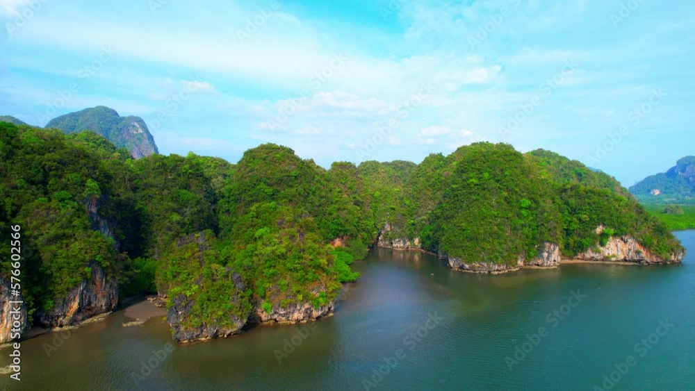The drone captured a stunning landscape of limestone mountains covered in lush forest, meeting the estuary where mangrove forests thrive, creating a unique ecosystem in Thailand. 4K UHD
The drone captured a stunning landscape of limestone mountains covered in lush forest, meeting the estuary where mangrove forests thrive, creating a unique ecosystem in Thailand. 4K UHD