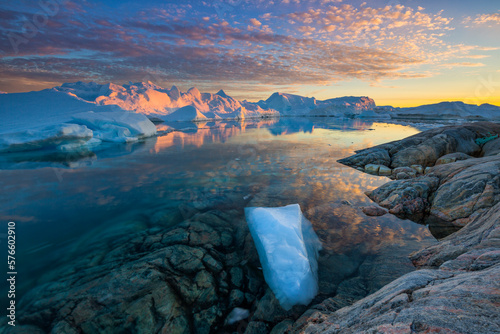 Clouds over Ilulissat Icefjord at scenic dusk, Greenland