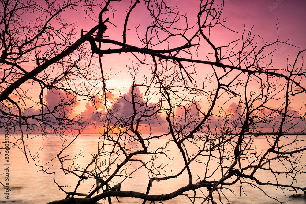 Sunrise on the beach paradise island Gulhi. Indian Ocean, Maldives