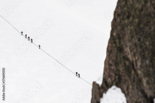 Group of people ski touring on a glacier in Val Thorens photo