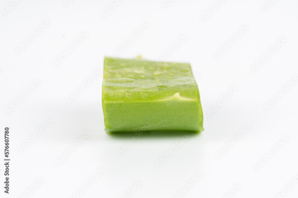 Fresh aloe vera leaves and slices isolate against white background for health and beauty products. Fresh aloe vera leaves and slices isolate against white background for health and beauty products.