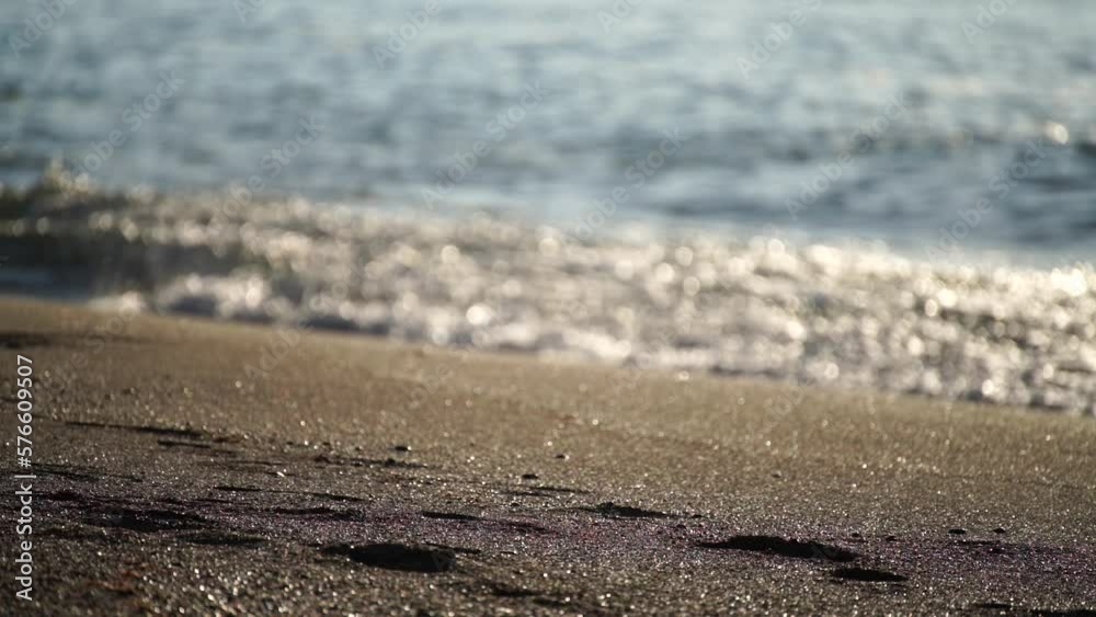 Waves white foam ocean. Sandy coastline with cinematic white sea waves. Beautiful seascape with water surface texture, foamy waves in slow motion Waves white foam ocean. Sandy coastline with cinematic white sea waves. Beautiful seascape with water surface texture, foamy waves in slow motion
