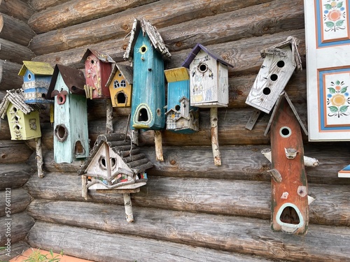 Cute Little Birdhouses On Rustic Wooden Wall © kaznacheeva