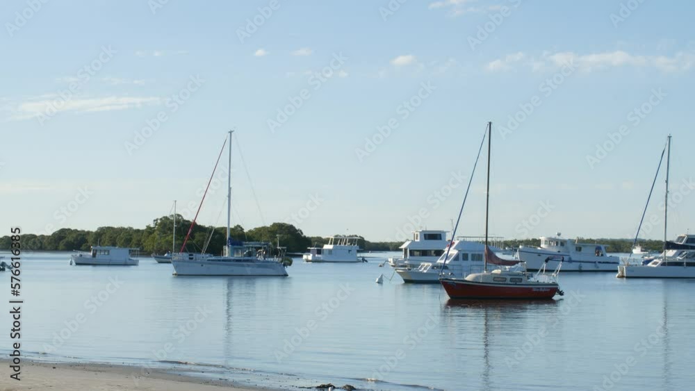 Boats Moored at Seaside Town Beach Afternoon in Gold Coast, Queensland, Australia. Boats Moored at Seaside Town Beach Afternoon in Gold Coast, Queensland, Australia.