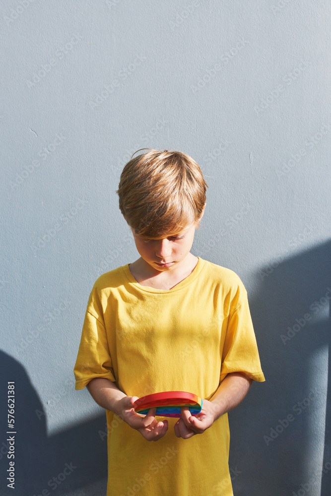Boy delighted, exited with this stressrelieving flapping fidget. Cure