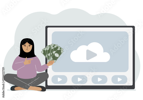A woman holds paper banknotes in his hand, next to a computer with a video. Freelancer, earning money, working on the Internet, training, coaching, business, remote work.
