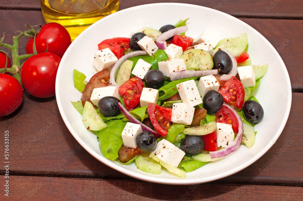 Greek salad with fresh vegetables closeup Greek salad with fresh vegetables closeup