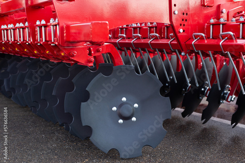 Fotografie Trailed in-line disc harrow at an agricultural exhibition.
