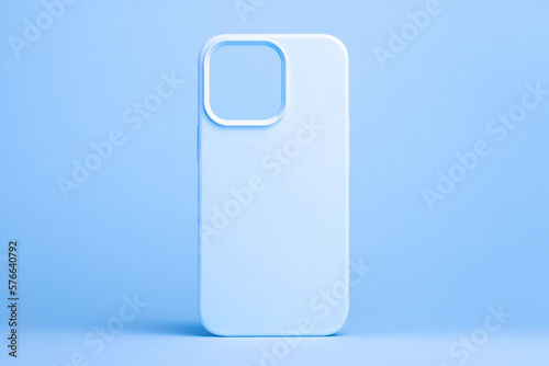 light blue case for iPhone 14 and 13 Pro max isolated on blue background, phone cover mock up in monochrome colours photo