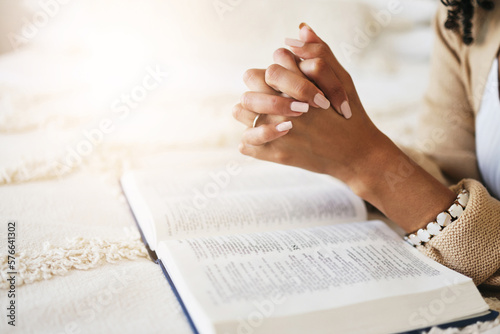 Prayer, bible and hands praying for religion, hope or help, spiritual or faith in home Fototapet